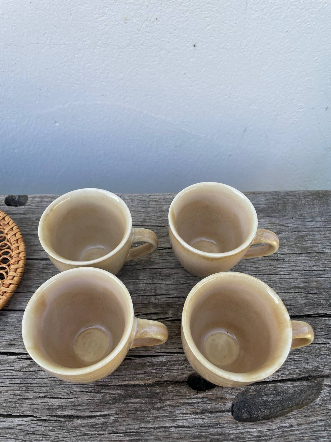 Ceramic and rattan coffee cups
