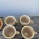 Ceramic and rattan coffee cups