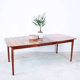 Extendable dining table in rosewood