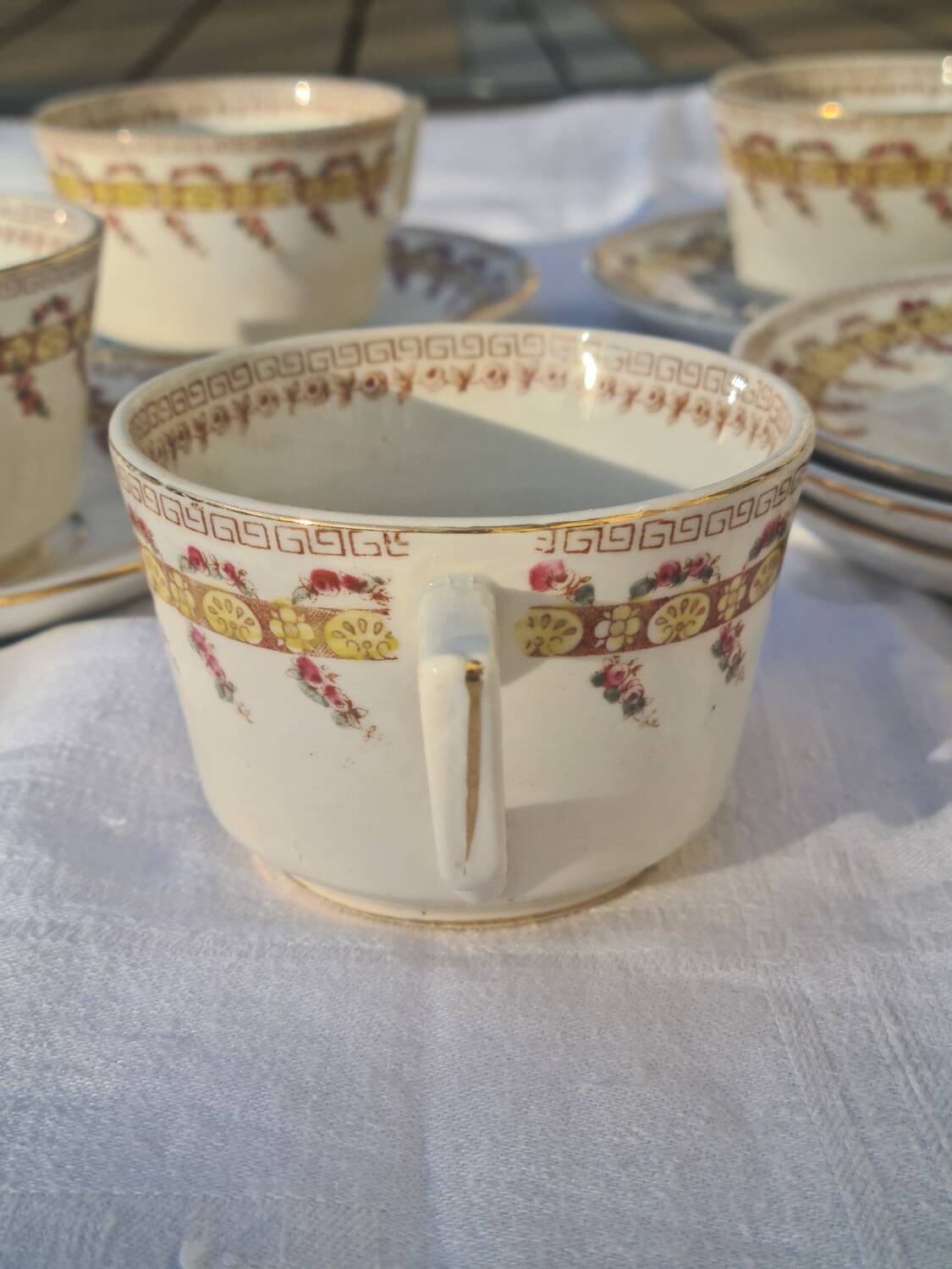 Gien opaque porcelain cups from the early 20th century