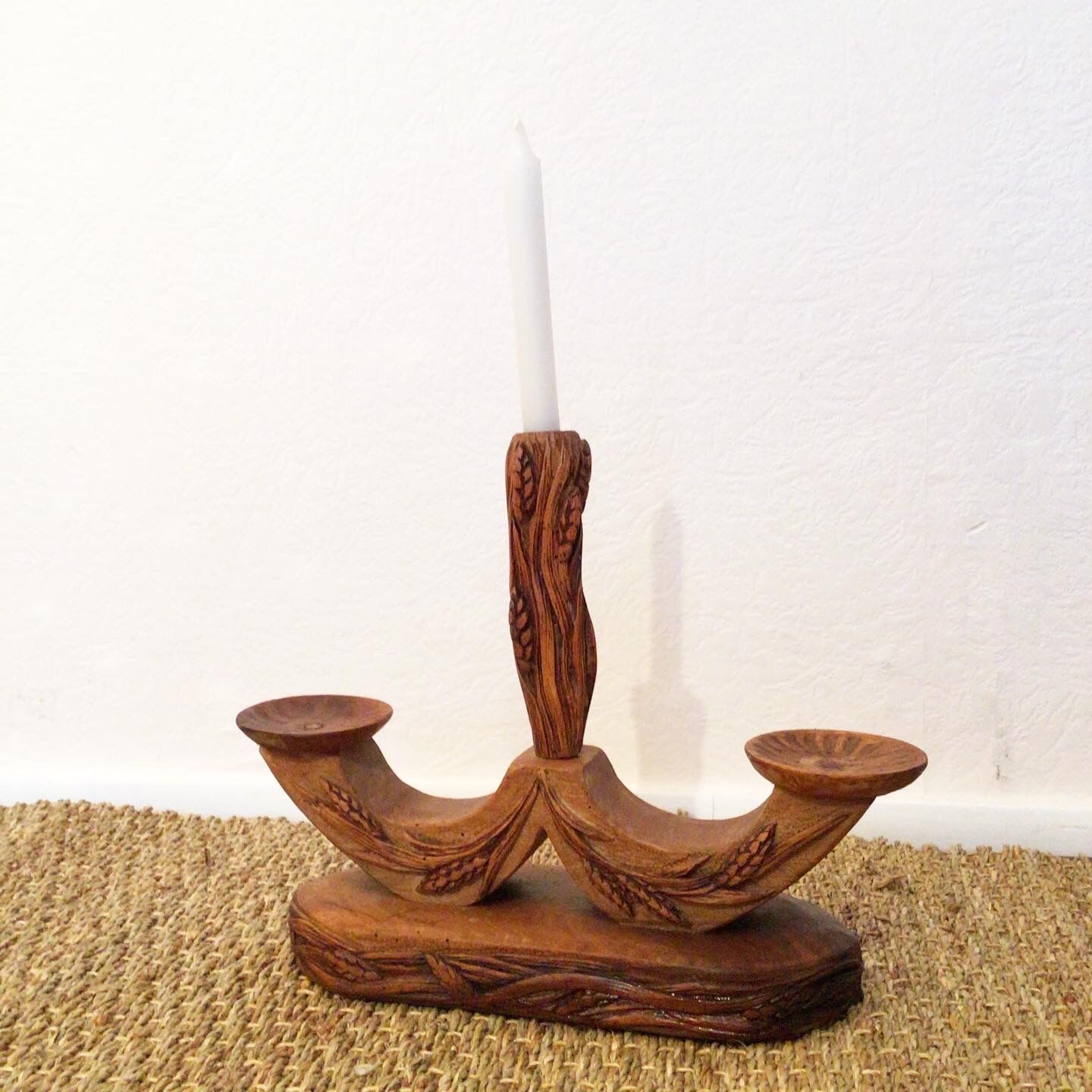 Carved wooden candle holder