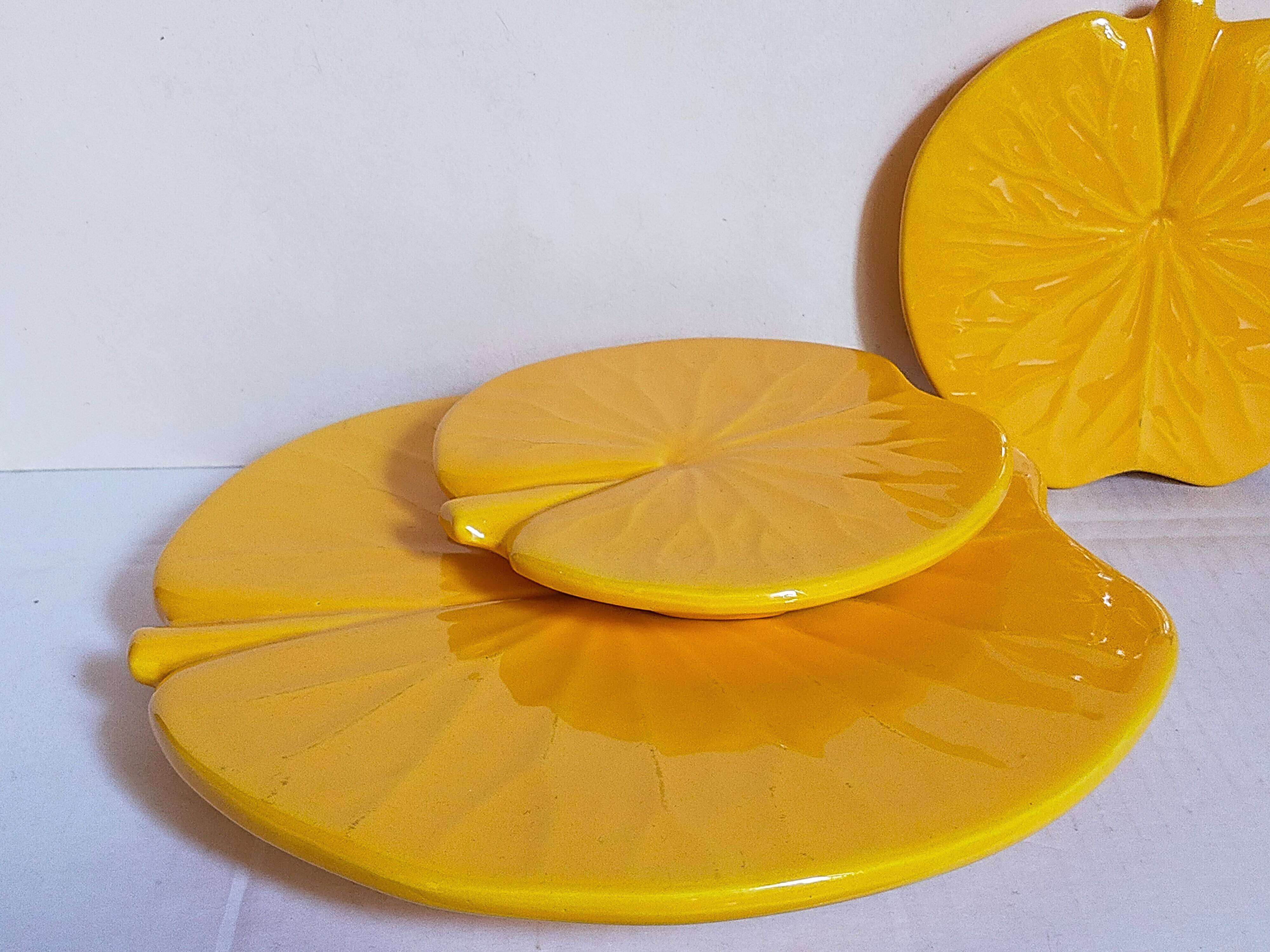 Three vintage water lily presentation dishes in slip