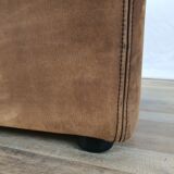 Fauteuil avec pouf en cuir et daim