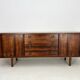 Danish rosewood vintage sideboard with sliding teak doors from the 1960s
