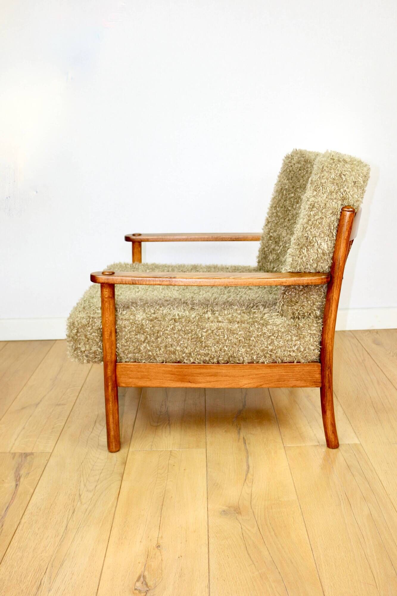 Wooden vintage brown armchair, olive green, long pile on removable cushions