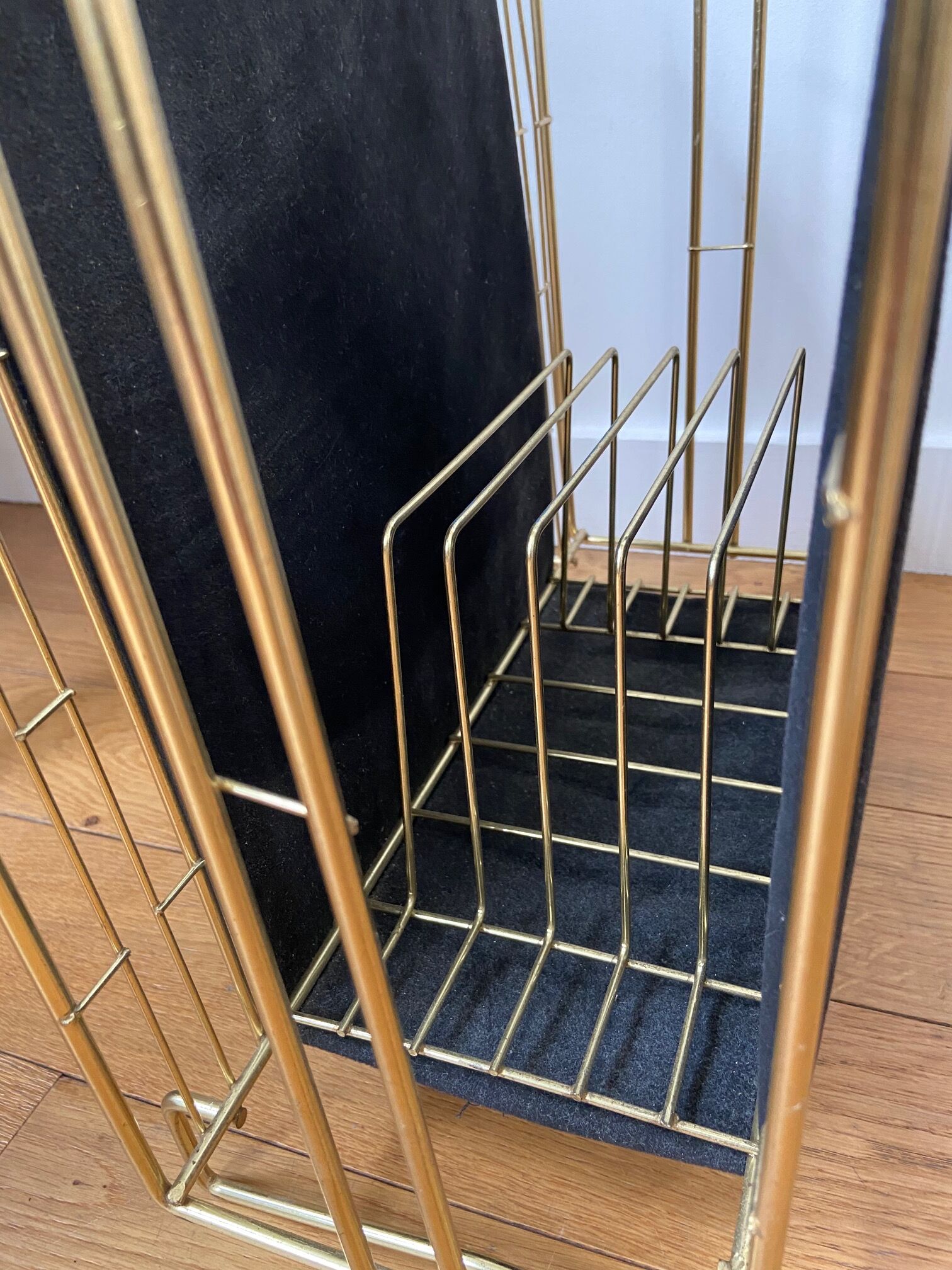 Gold metal, wood and black cotton magazine holder