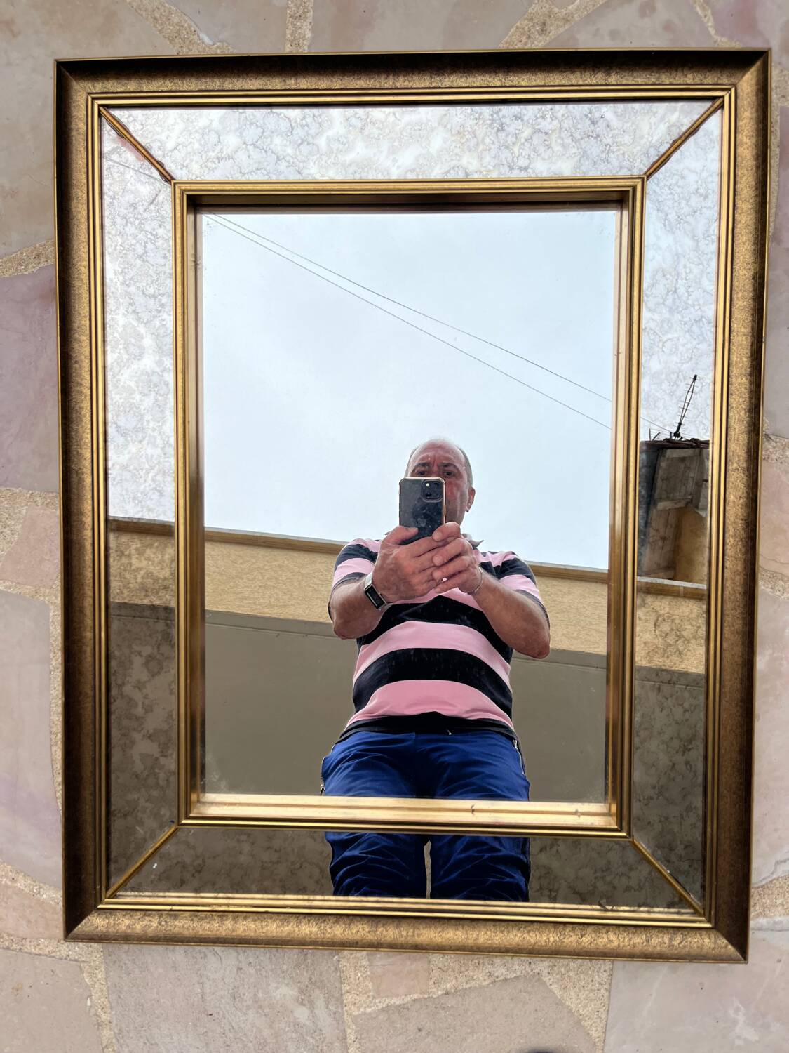 Antique rectangular mirror in gilded wood with glazing beads