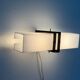 Simple white plexiglass wall light with a black metal frame, 1970s, Germany.