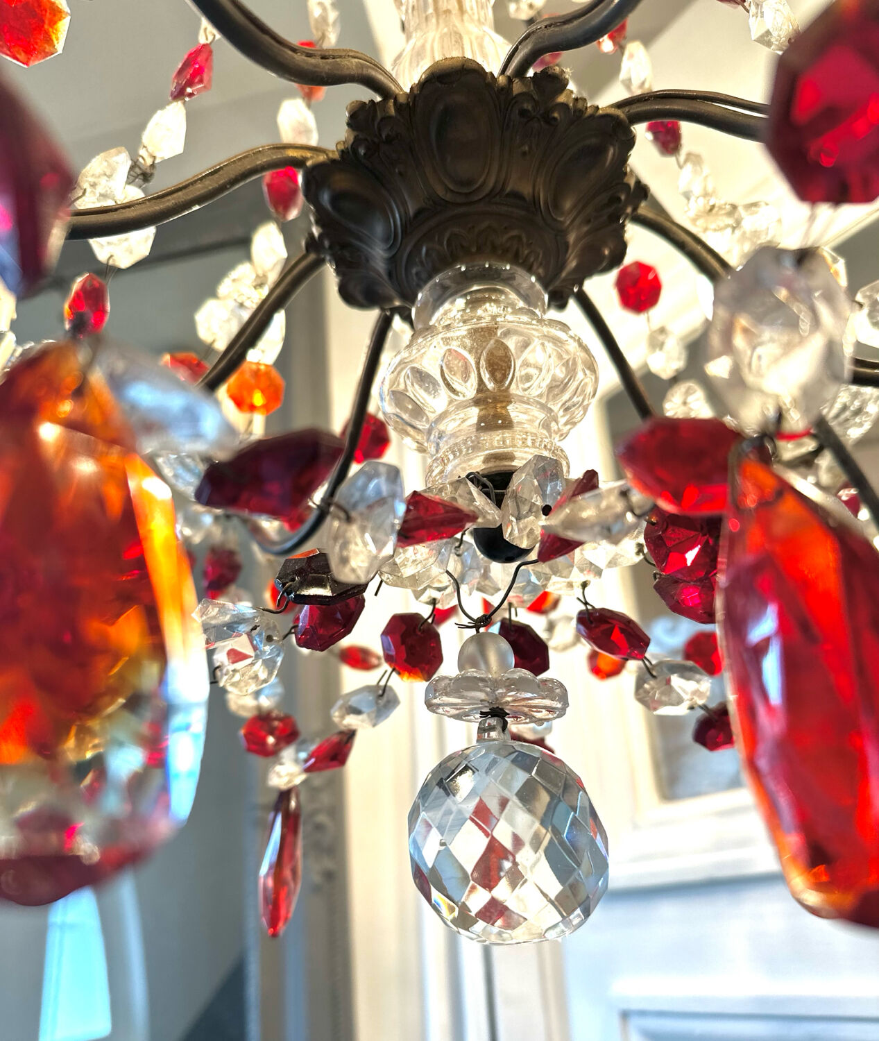 Antique chandelier with red crystal pendants, 9 lights.