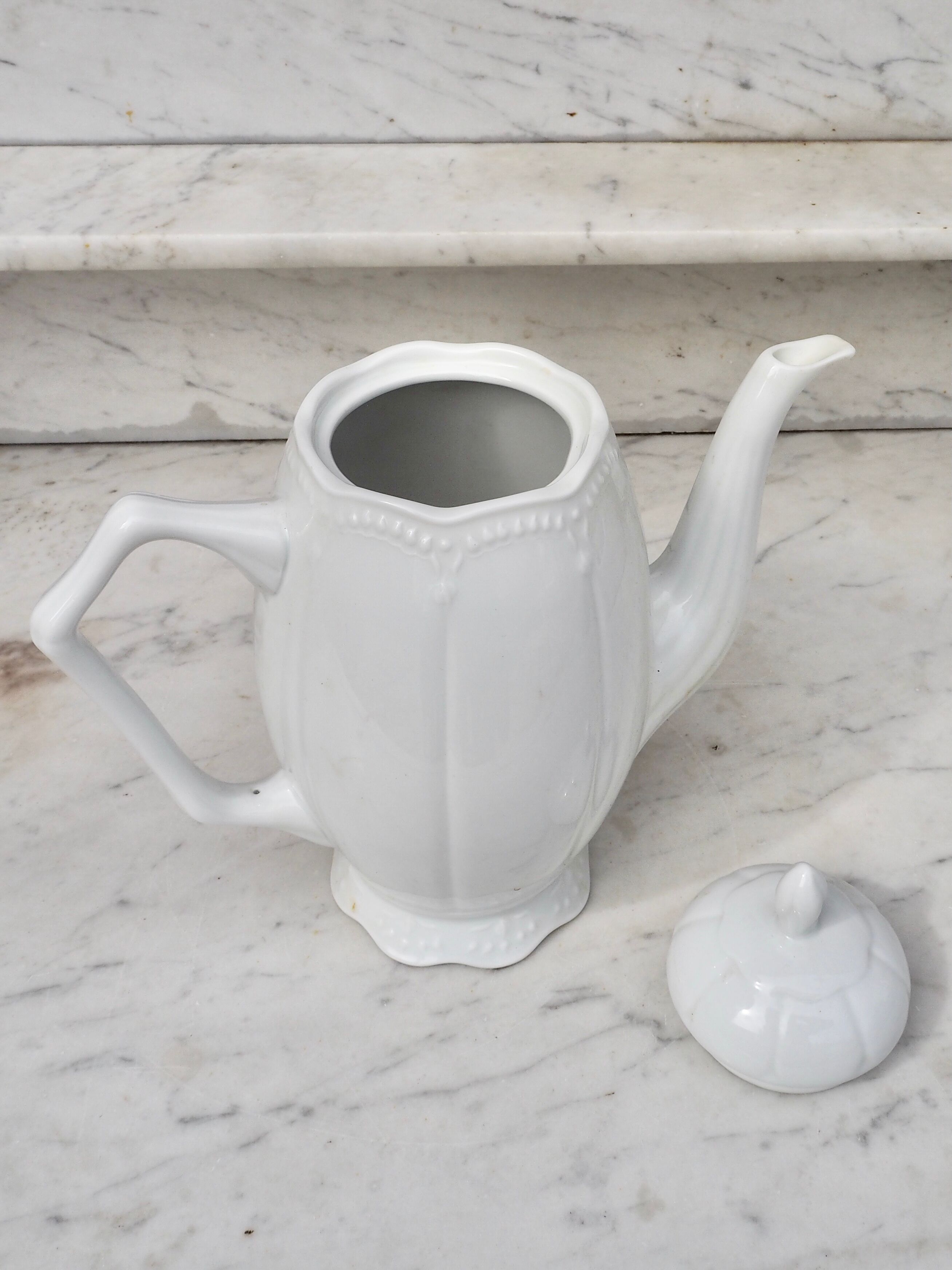 Worked white porcelain coffee maker
