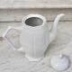 Worked white porcelain coffee maker