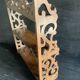 Antique shelf with openwork wooden pediment, early 20th century