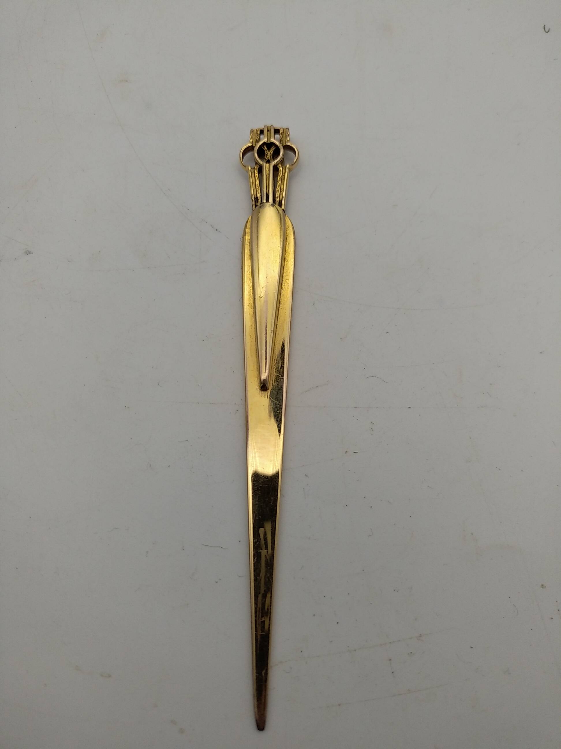 Gold plated letter opener.