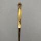 Gold plated letter opener.