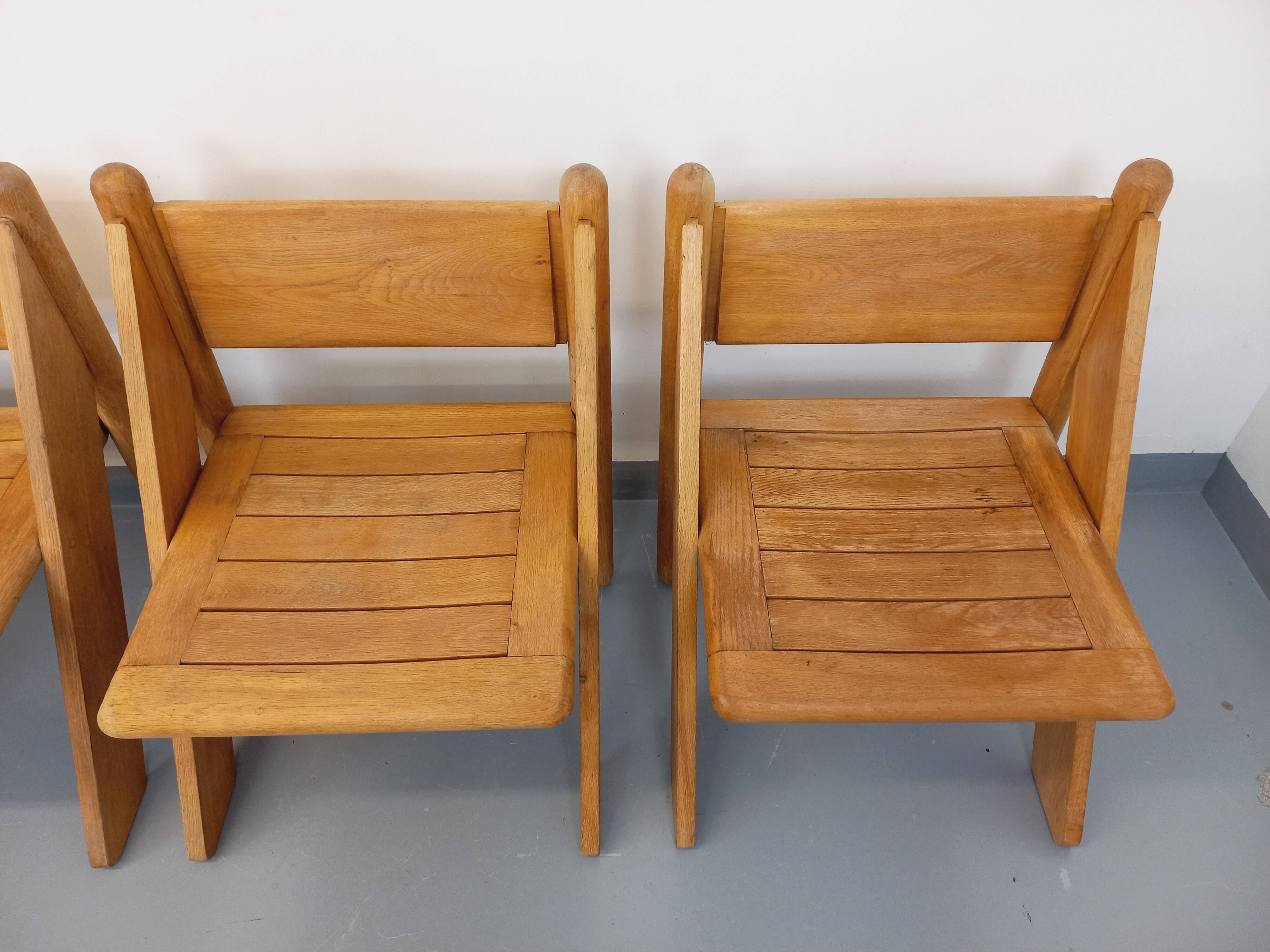 Set of 4 vintage brutalist chairs in solid oak from the 1960s.