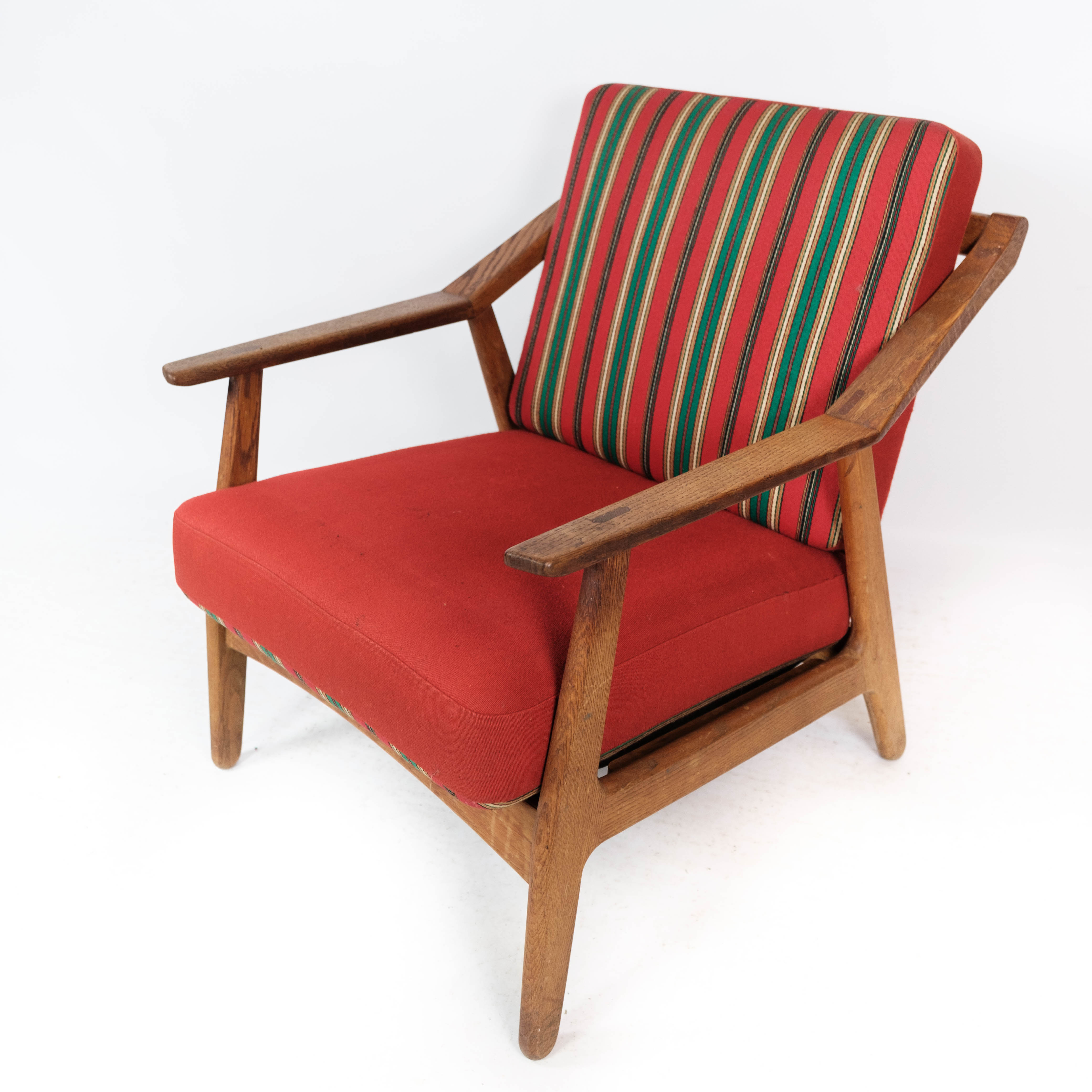 Armchair in oak and upholstered with red fabric, designed by H. Brockmann Pedersen, 1960s