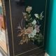 Buffet of black and gold laqué Chinese storage with relief subjects decorated flowers painted birds