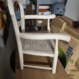 Low wooden children's chair with canework