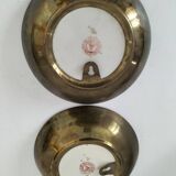 Pair of vintage Chinese decorative plates with floral decoration on a yellow background