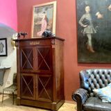 Cabinet, wardrobe or mahogany and ormolu wine bar in French Empire style with four doors.