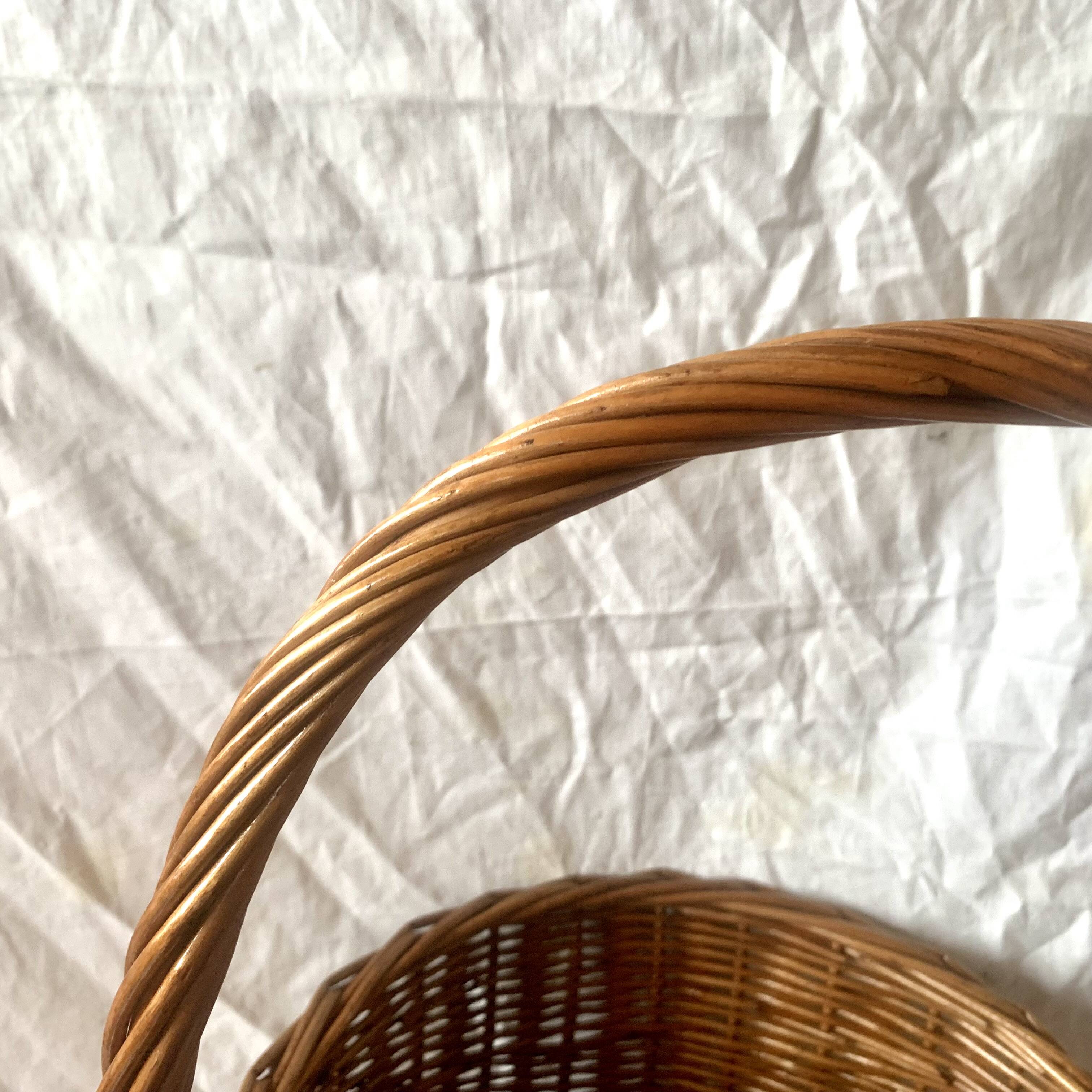 Old woven wicker umbrella stand
