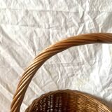 Old woven wicker umbrella stand