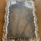 Silver metal top and decoration of foliage and handles in vintage brass