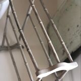 Old bathroom towel rack in patinated wood