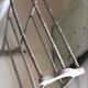Old bathroom towel rack in patinated wood
