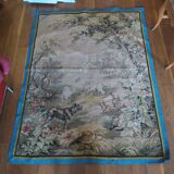 old braided wall tapestry the wolf and the lamb