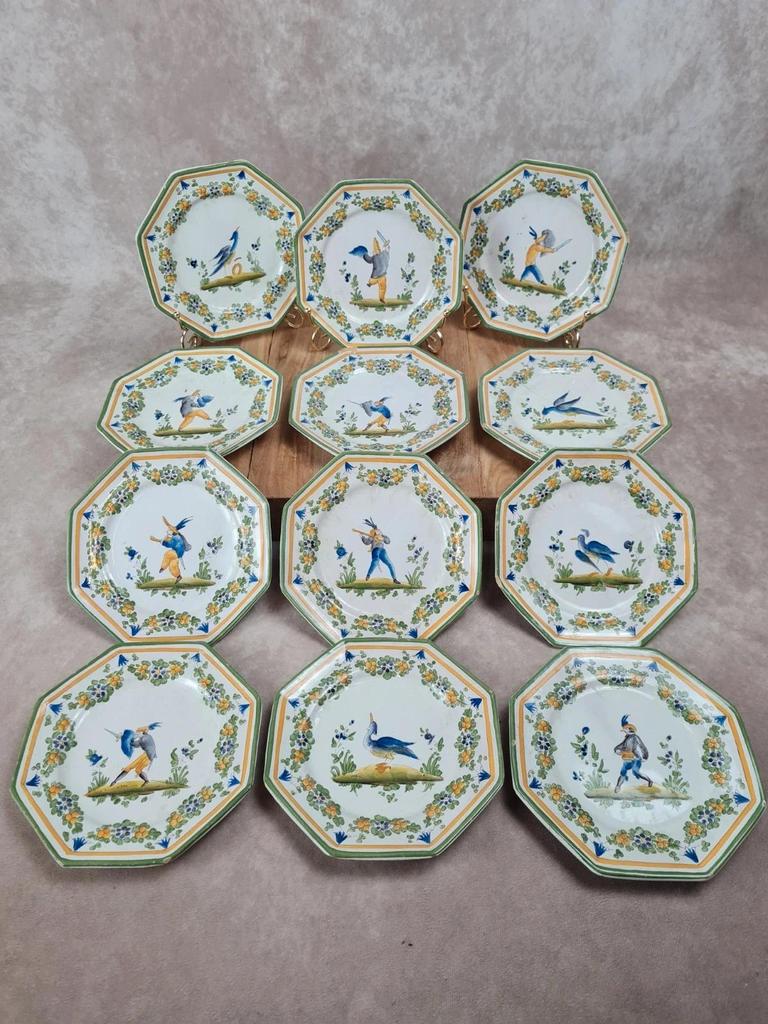 Set of 12 small antique plates by Alfred Renoleau, different designs.