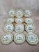 Set of 12 small antique plates by Alfred Renoleau, different designs.