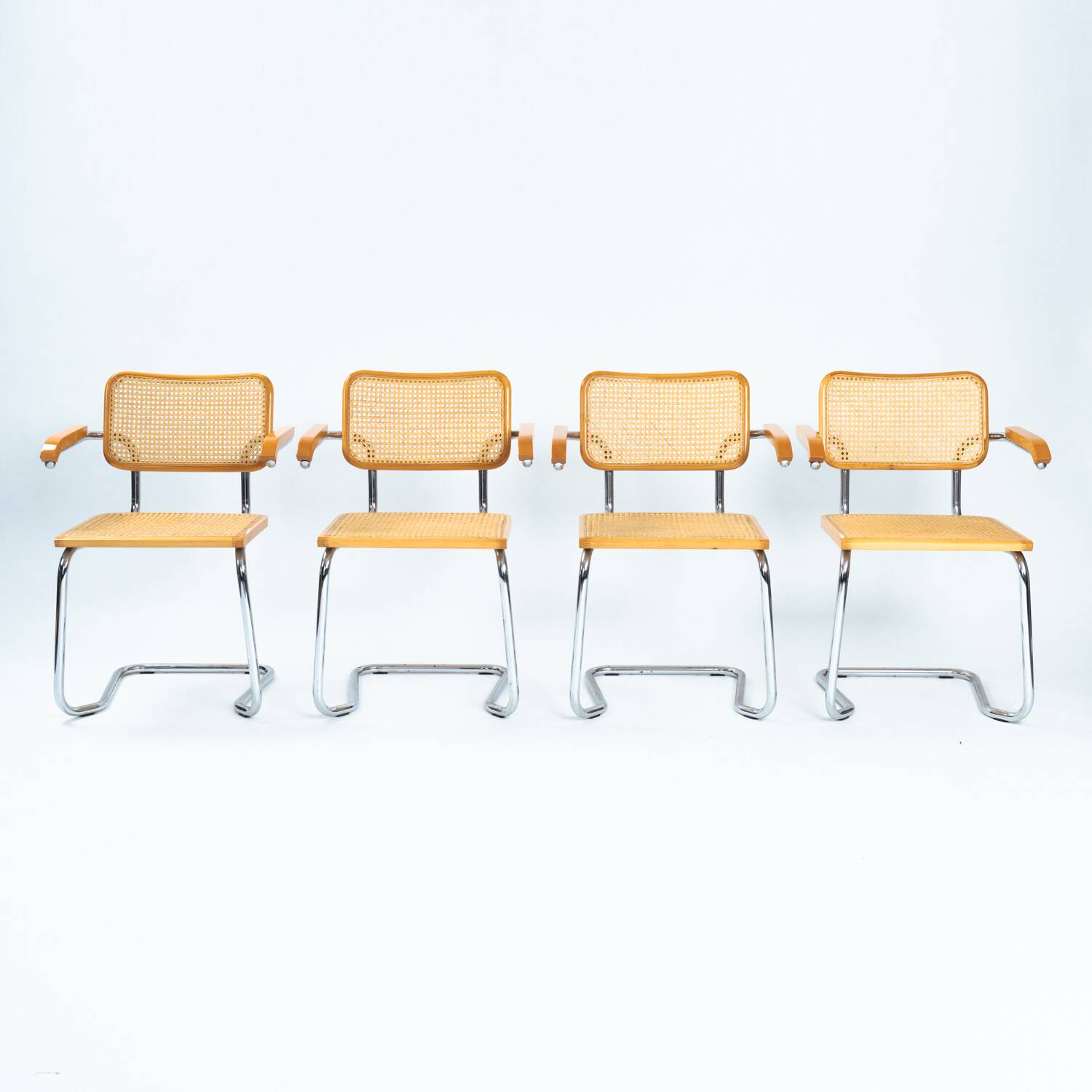 4 Bauhaus wicker chairs, in the style of Marcel Breuer, stackable