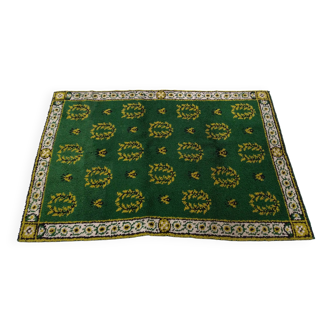 Old green Berber carpet
