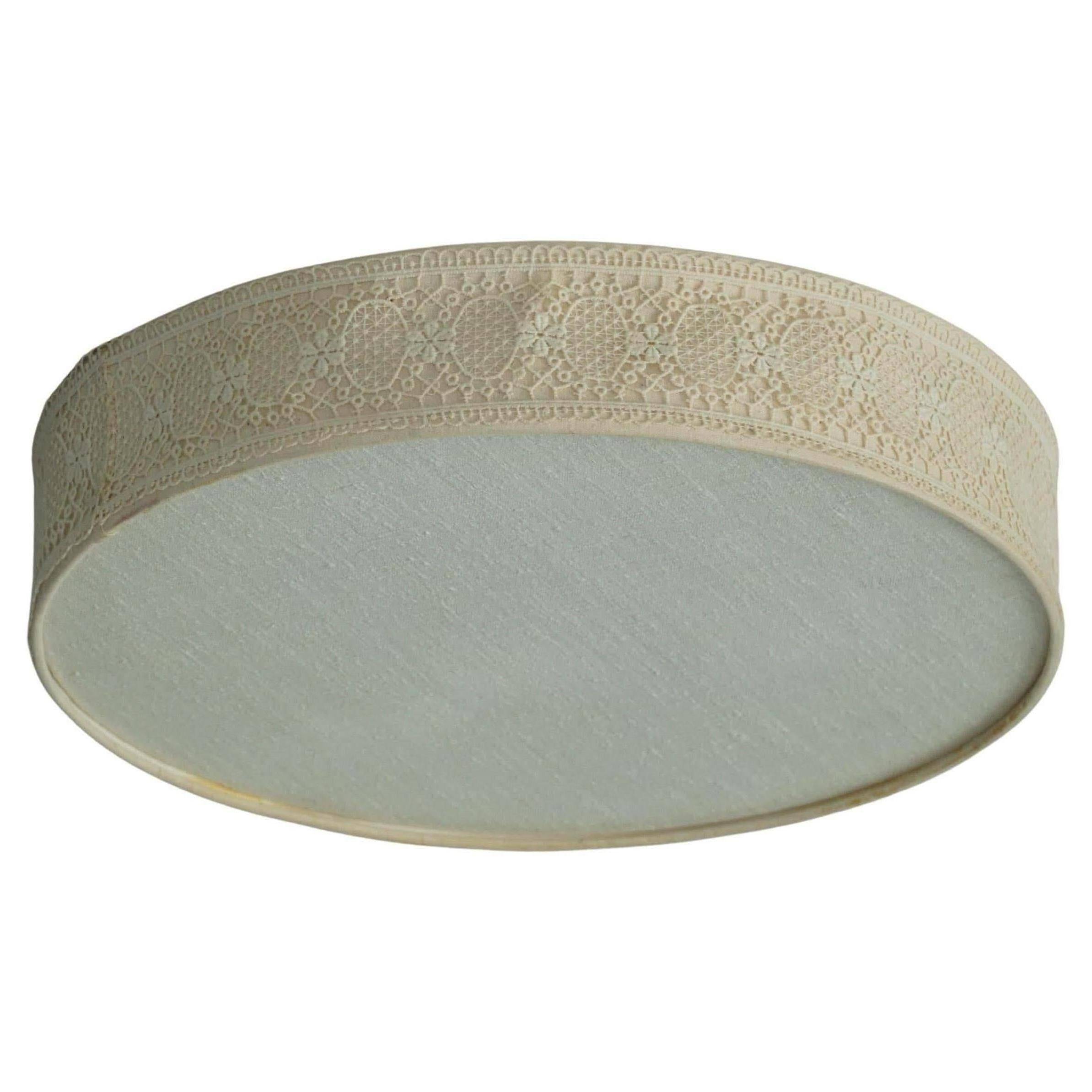 Mid-century modern wall sconce and ceiling light in linen and lace, Sweden, 1950s.