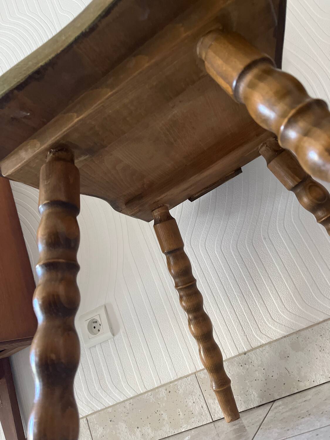 Wooden dressing table with olive green chair and floral patterns