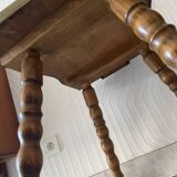 Wooden dressing table with olive green chair and floral patterns