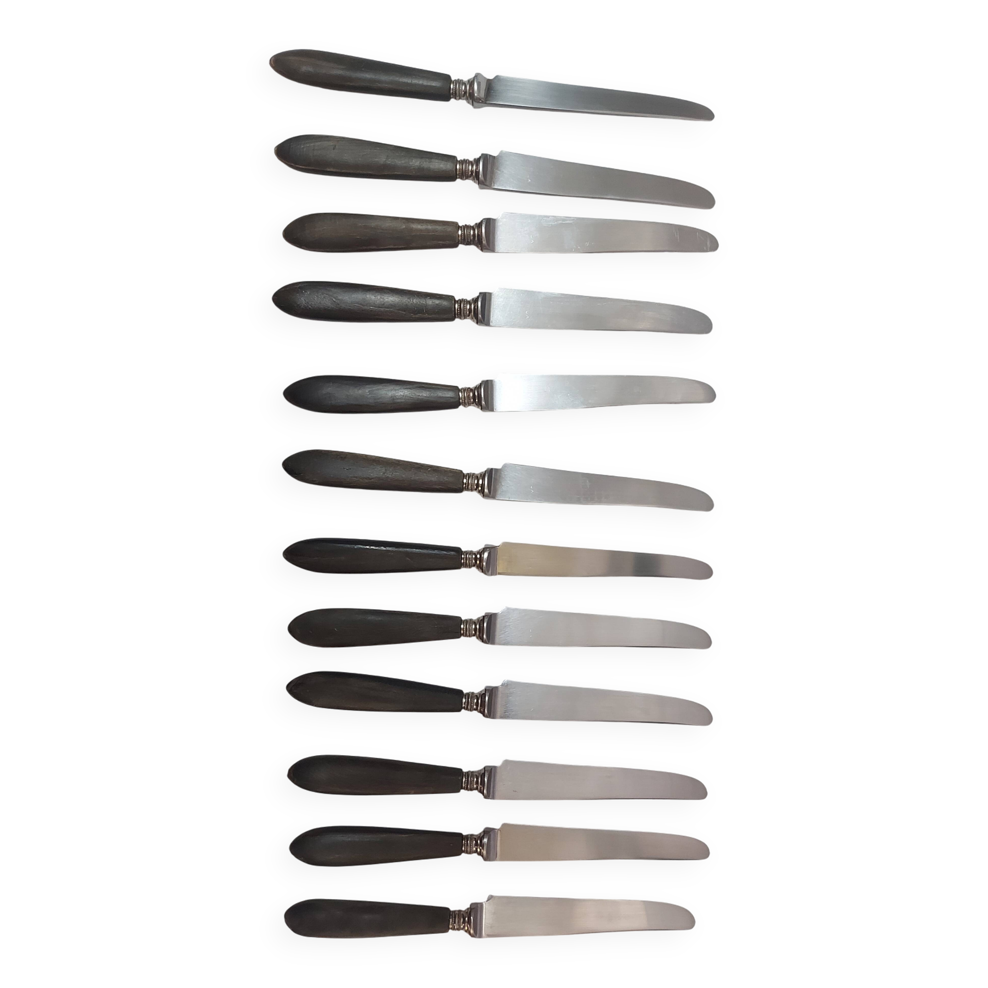 12 ebony handled knives, 1950