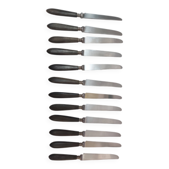 12 ebony handled knives, 1950