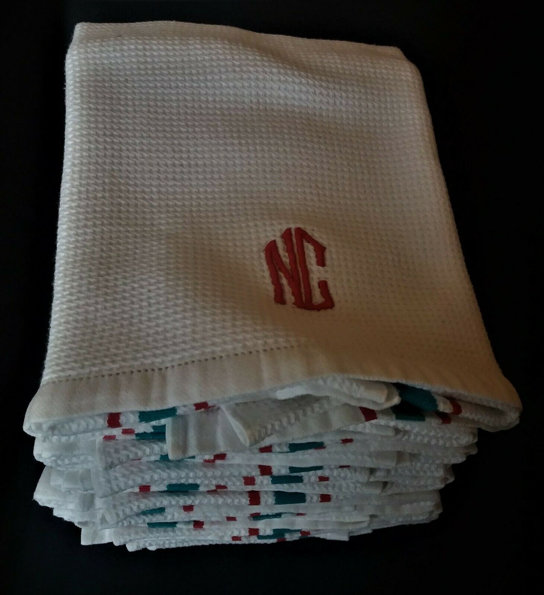 Set of ten antique cotton honeycomb towels hand-embroidered figure