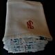 Set of ten antique cotton honeycomb towels hand-embroidered figure