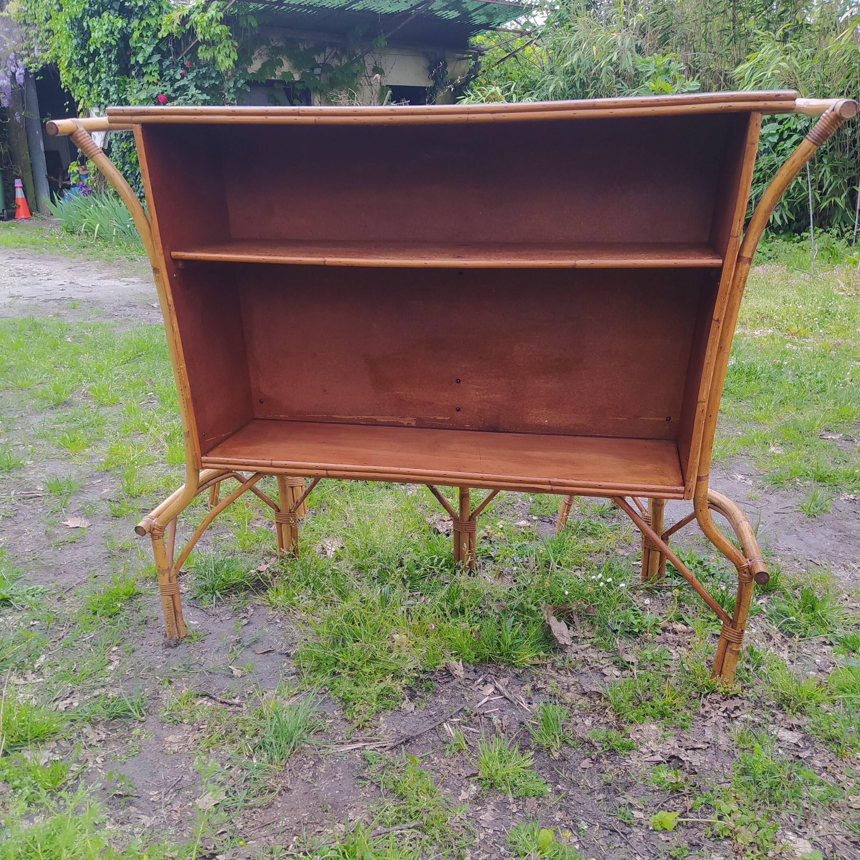 Vintage rattan bar with 1960s earthenware tile decor with 2 stools