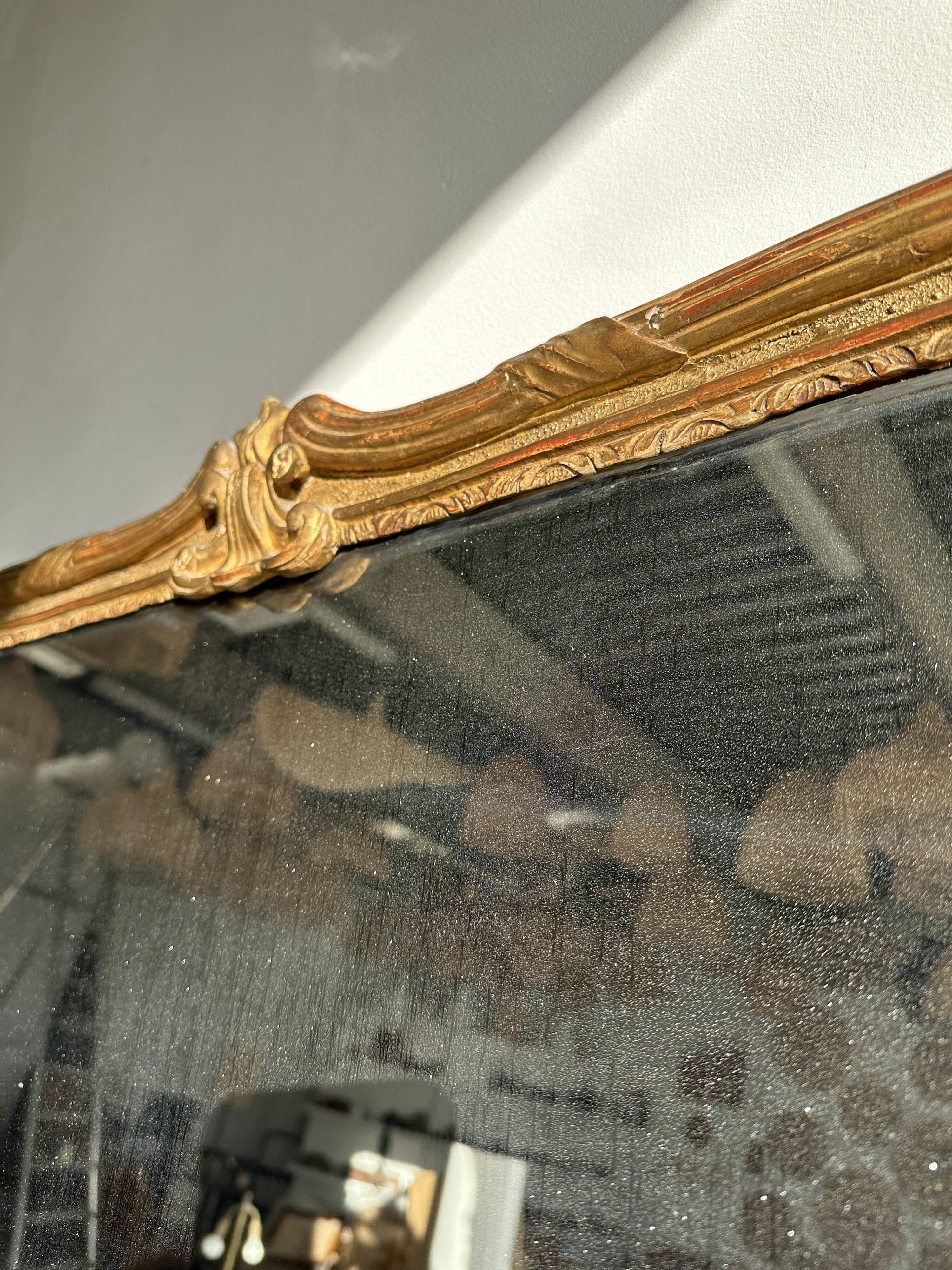 Large gilded mirror 19th century rounded corners mercury glass Louis XVI style