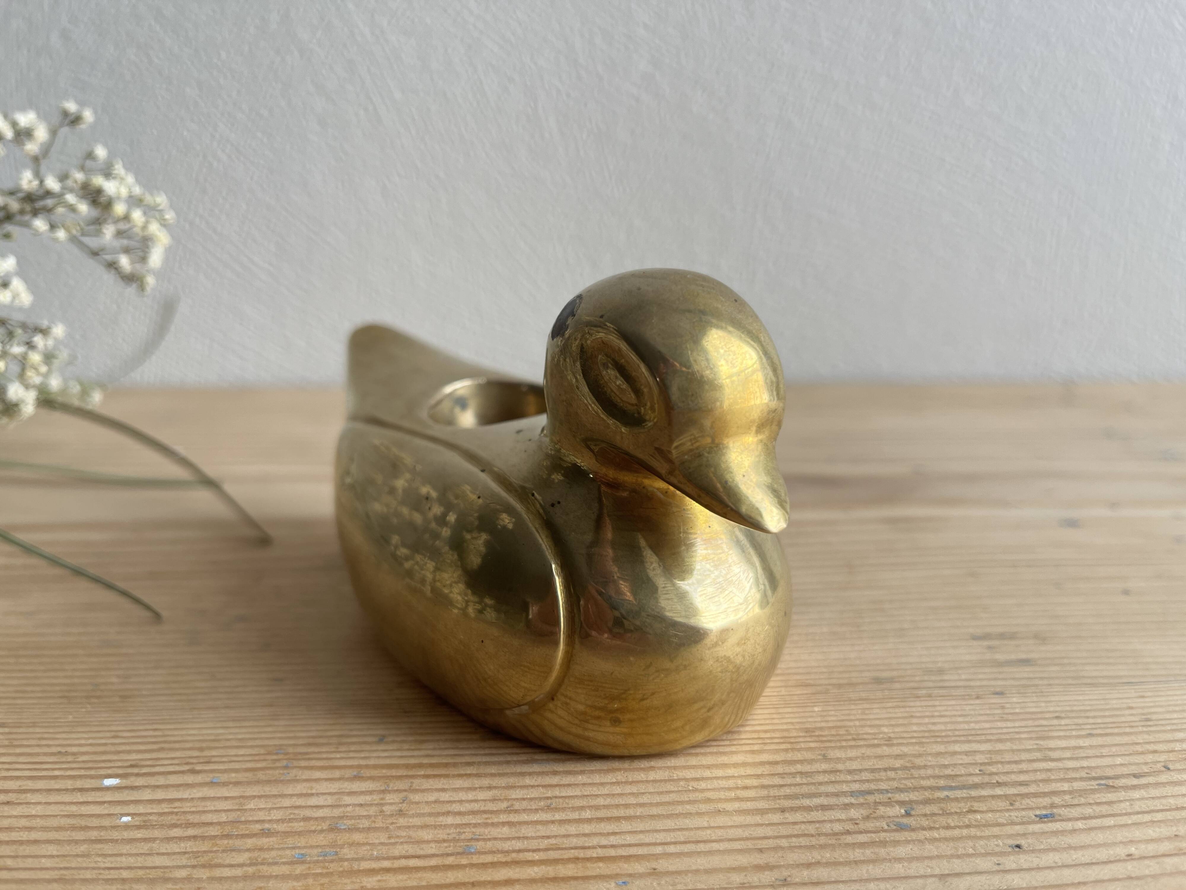 Brass duck candle holder