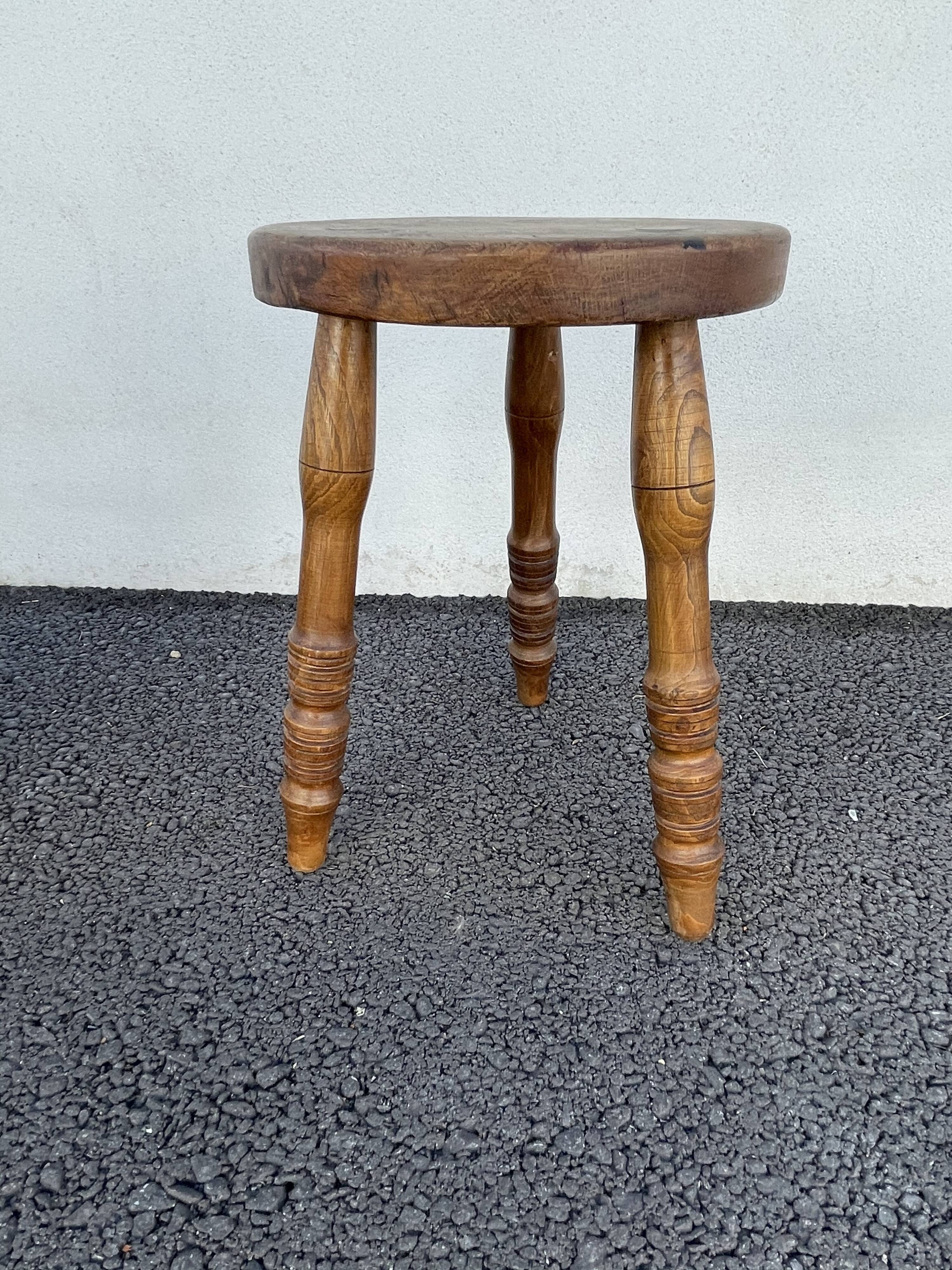 Wooden tripod stool