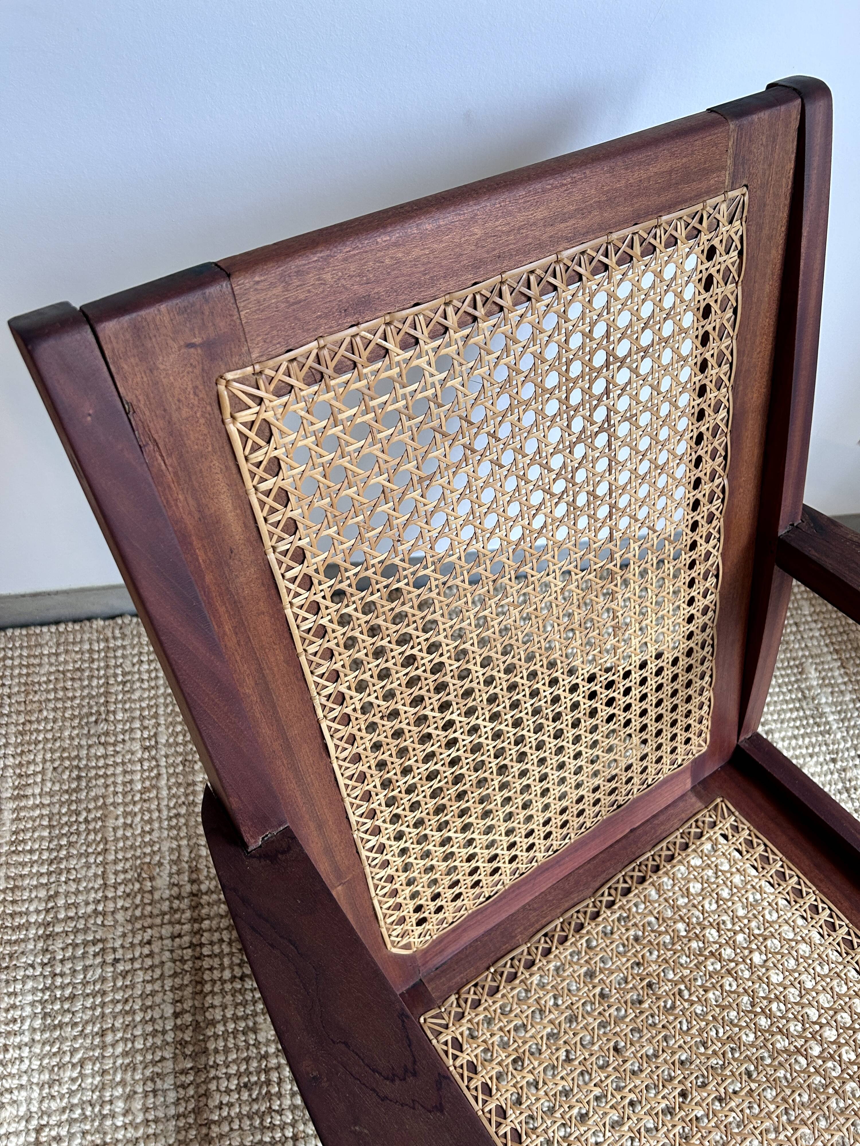 Reconstruction armchair in teak and caning