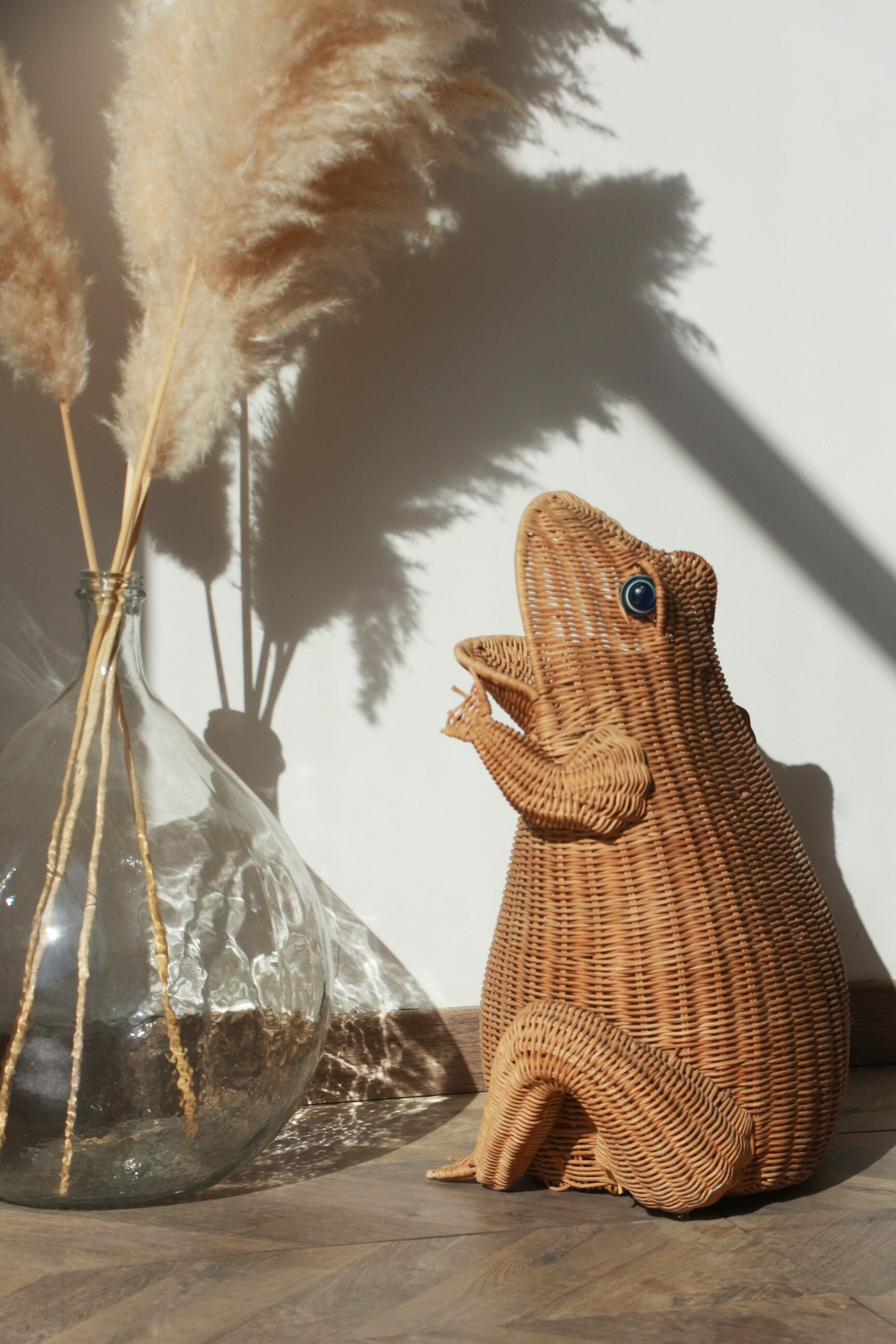 Wicker frog magazine rack by Olivier Cajan