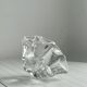 Empty pocket ashtray in transparent crystal organic shape.