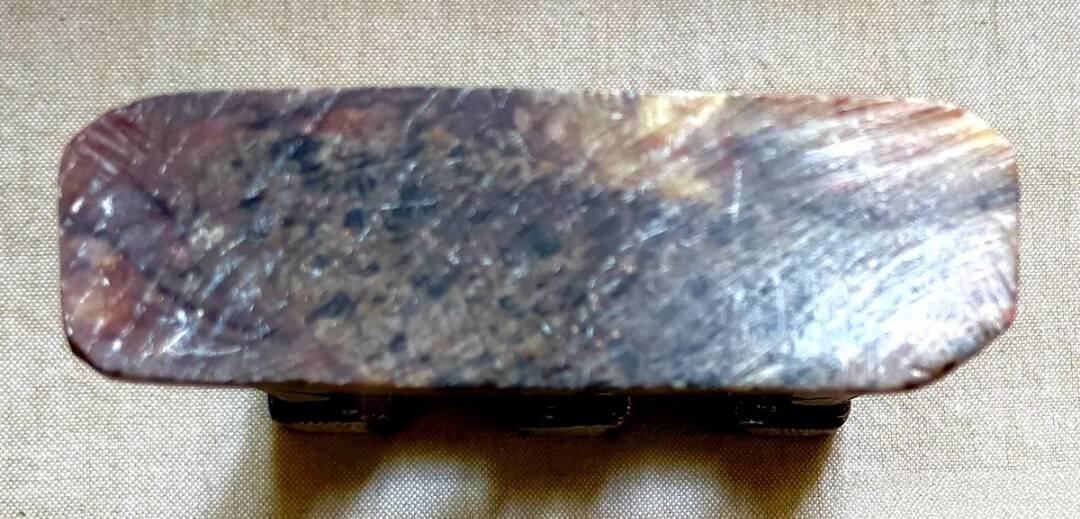 Three-branched stone candlestick adorned with birds, North Africa