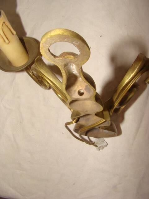 Pair of bronze wall lights with 2 arms in "Dutch" style.